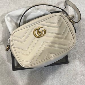 Gucci Matelassé Mini GG Marmont Crossbody Bag in White.